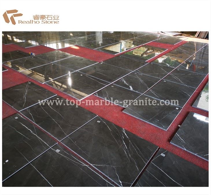 laying marble floor tiles